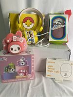 Full set of items including kid's camera, headphones, fans and night light
