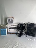 Wide view showing all four cooling fans and the boxed HDMI Upconvert DVD Player.