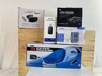 Full lot with all boxed items: handheld vacuum, car camera, wireless CarPlay adapter, aromatherapy diffuser, cassette recorder.