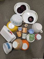 Group view of all glass and ceramic pieces laid out