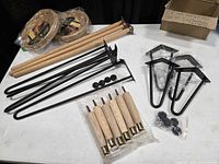 All items on table: four dowel legs, long and short hairpin legs, tapered wood legs, bamboo plate holders