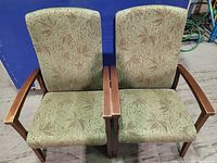 Front view of two matching armchairs