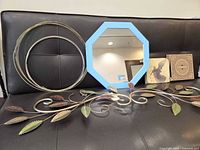 All items together: mirror, wall decor, hoops, angel print with gift box