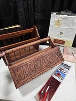 Both wooden magazine racks, car bow package, nightdress package, sheet music assortment