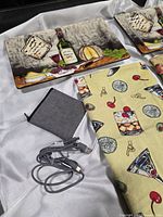 Cable, pouch, one platter, yellow cocktail towel displayed