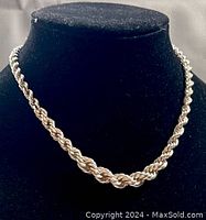 Chain displayed on black bust to show overall appearance and length