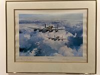 Framed full view of print within mat and frame showing twin Lancaster bombers over clouds