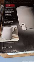 Box of the LG Portable Air Conditioner LP0621WSR showing the product image, model number, and features.