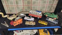 Full shelf view showing all vehicles and accessories laid out.