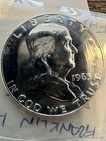 Obverse of the 1963 Franklin Half Dollar showing Benjamin Franklin's profile with inscriptions and date.