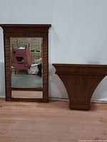 Front view of console and mirror set showing size and overall design