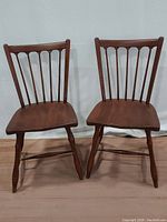 Pair of Pennsylvania House chairs side by side showing front and backrest detail