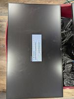 Top view of one Dell U2417H monitor showing screen with on-screen display message