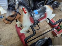 Side view of the Hedstrom kids riding horse showcasing color and design details.