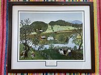 Full view of the framed print showing the entire pastoral scene with double matting and walnut stained frame.