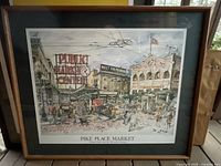 View of the full framed print showing Pike Place Market, including the frame and matte