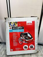 Front of cardboard box showing Schwinn branding, color product image and feature list