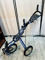 Blue Sun Mountain golf push/pull cart standing upright showing overall condition and design