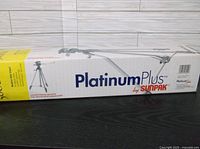 Box displaying the Platinum Plus by Sunpak branding and tripod image.
