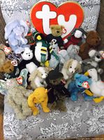 Overview of the Ty Beanie Babies showing various animals including elephant, bears, panda, and penguin.