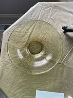 Top-down view of the yellow Madrid pattern Federal glass bowl showing the etched floral and scroll design.