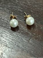 Pair of pearl stud earrings on 14k gold posts