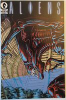 Front cover of Aliens #4 comic book showing an alien creature with dark blue and red highlights against a dark background.