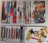 Overview of the complete Codename Knockout #0-23 comic book set showing all front covers, arranged in two rows with mostly upright orientation, displayed to highlight cover art and spines.