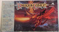 Top view of Dragon Lance game box with fantasy red dragon and sword artwork