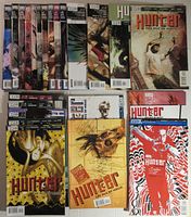 Complete set of the Hunter The Age of Magic comics arranged showing spines and front covers, 25 issues including varied painted covers with fantasy themes.
