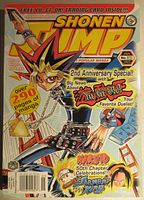 Front cover of Shonen Jump magazine issue #25, January 2005, showing colorful artwork of Yu-Gi-Oh! character and promotional text about included content and trading card.