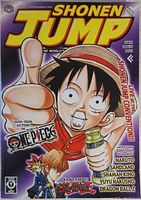 Front cover of Shonen Jump #4 April 2003 featuring Monkey D. Luffy from One Piece giving a thumbs-up with titles of manga series listed on the cover.