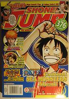 Full cover of Shonen Jump magazine issue #52 showing various manga characters including Naruto, Bleach, One Piece, and Yu-Gi-Oh! GX with 376 pages noted