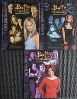 Photo of three Buffy The Vampire Slayer roleplaying game books: Core Rulebook, Slayers Handbook, and The Magic Box, showing front covers.