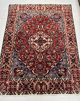 Full view of rug showing overall design and condition