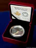 2016 Canadian $20 silver coin in original red display case with certificate behind the coin.