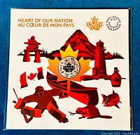 Front view of sealed coin packaging showing maple leaf with coin and Canadian cultural symbols in red, orange, and white.