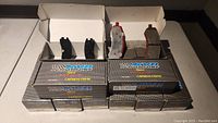 Lot of 10 boxes of KVR Performance brake pads with some pads visible and packaging showing brand and product type.