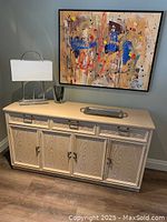 Front view of the Drexel sideboard showing three drawers and four cabinet doors in pickled pine finish.