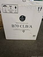Original boxed Keurig B70 CLB/A single cup home brewing system with handling instructions visible
