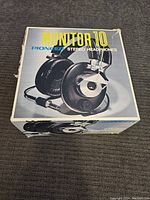 Original box showing vintage design, branding, and product image of the headphones