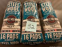 Three packs of Rhodes American Steel Wool, Fine #0 grade, 16 pads per pack in original packaging.