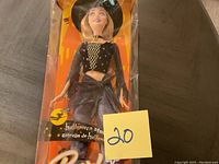 Front view of Halloween Barbie doll in original packaging, showing the full doll and Halloween design.