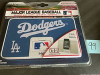 Front view of Dodgers MLB-themed portable speaker system in original packaging, showing dock and branding.