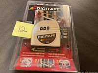 Photo of the Starrett Digitape 16' digital tape measure in sealed packaging showing product front and label.