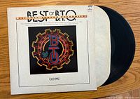 Front cover of the Best of BTO album with record partially visible.