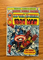 Front cover of the Marvel Double Feature #1 comic book showing Captain America and Iron Man with colorful artwork and text.