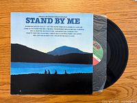 Front of the Stand By Me vinyl record album cover with vinyl record partially pulled out inside a clear plastic sleeve.
