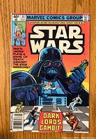 Front cover of Star Wars #35 comic featuring Darth Vader and Star Wars characters, bright color print with vintage price of 40 cents.