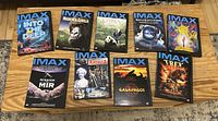 Front covers of 9 IMAX DVDs showing documentary themes and titles.